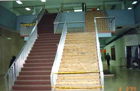The staircase inside the main entrance in the Eastwood Mall during renovations in the 1990's. Dated March 3, 1995