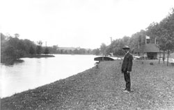 Man standing on beach along Meander Creek