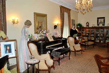 The square grand piano donated by the Behners from the Taylor house is located in the library of the Ward-Thomas Museum.