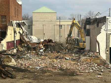 Demolition of Reisman's store next to Robins Theatre on South Main Street.