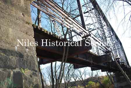 Photographs taken in 2011 of the iron bridge over Meander Creek. This historic bridge was incorporated into part of the Niles Bike Trail.