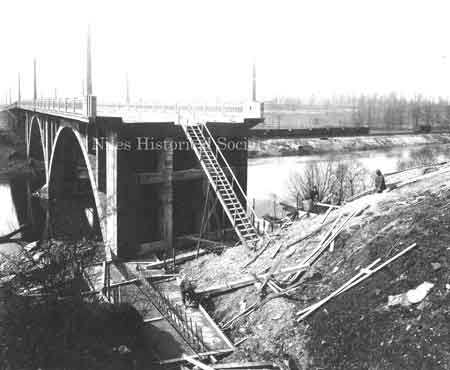 A wooden staircase was used to reach the unfinished portion of the viaduct. This picture was taken from the McDonald side of the bridge, looking north. The viaduct was constructed almost entirely of concrete with very little steel being used.