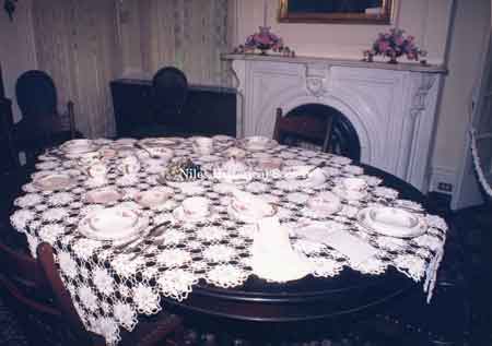 Photo taken in the Thomas House dining room of a table set with Atlas China.