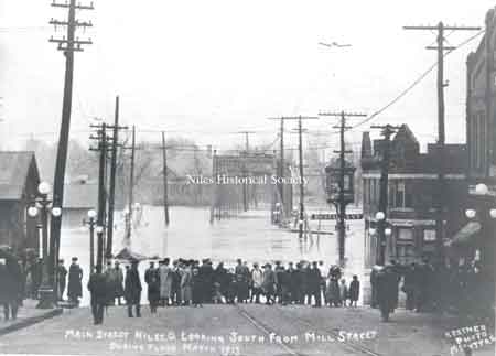Main Street looking south from Mill Street during flood, March 1913.