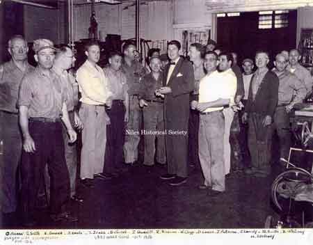 Ronald Reagan with identified workers. 