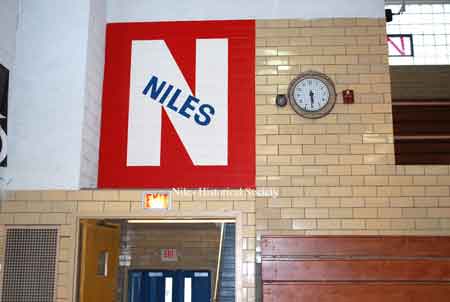 Niles logo over gymnasium side door.