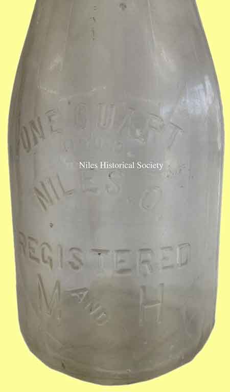 Glass bottle used by Madden-Hubbard Milk Company.