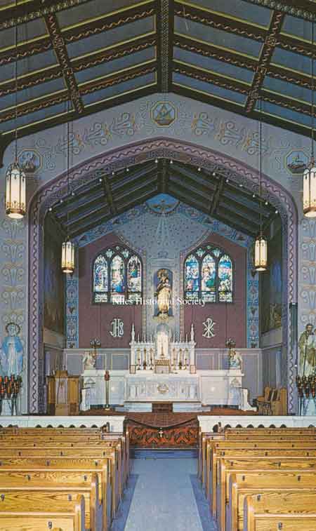 Interior view of the altar and main nave of Mount Carmel Church.