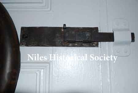 Close-up of original front door bolt