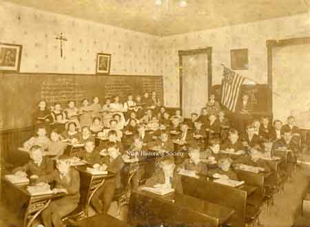 View of a grade school classroom and children attending St. Stephen's parochial school.