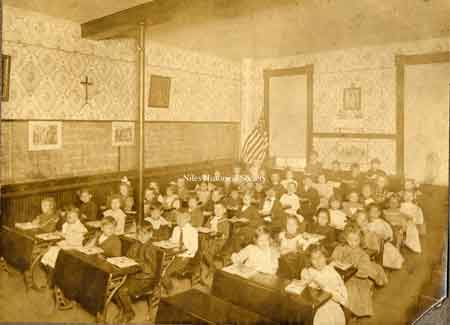 View of a grade school classroom and children attending St. Stephen's parochial school.