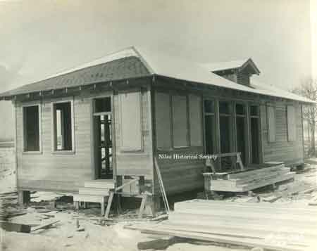 This is the hospital, time office and police station under construction. Taken Dec. 20, 1920.