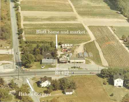 Aerial view, looking east and south, of the intersection of State Route 422 and Niles-Vienna Road taken in 1973. Blott’s Farm Market, family house and fields are centered in the photograph.