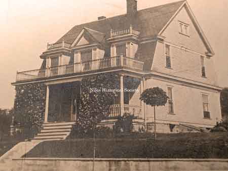 Postcard of the house at 219 North Bentley.