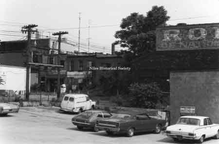 Rear view of several East Park Avenue buildings before urban renewal. Note Spot Restaurant rear entrance.
