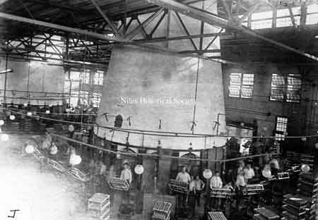Photo of one of the glass furnaces and crew at the Fostoria Glass Works, later GE.