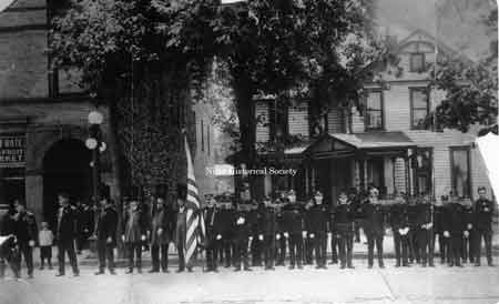 The Knights of Pythias members in front of the Wagstaff building, which stood north of the Swaney building on the west side of North Main Street.