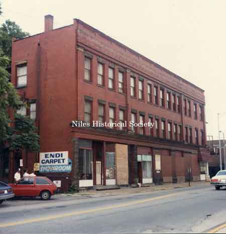 Photo of the Swaney Building when it housed Calvin’s Drug Store and the IOOF. These two buildings were demolished January 1990.