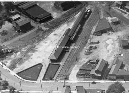 Aerial view on the right shows the B&O freight yard and terminal, grain & Feed store at the curve on Church Street which connected to Robbins Avenue.