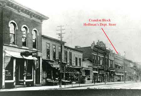 East side of south Main Street with the Crandon Block marked by the red arrow.