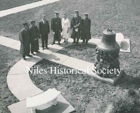 The 1959 Senior Class Project, under the sponsorship of Miss Anna Compana, had the bell moved from the old McKinley High School to a pedestal in front of the new Niles McKinley High School.