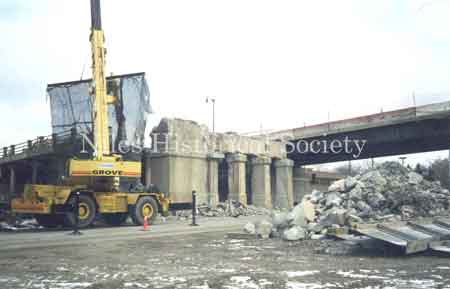 Photo showing the destruction and rebuilding of the Niles Viaduct connecting the south side of the city to the downtown area. 2002