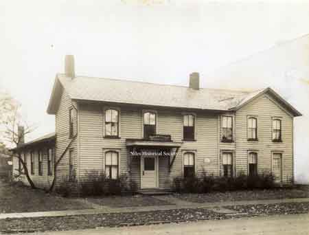 A photo of the Parish House of First Christian Church which was purchased in 1918 and razed in 1966. 