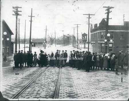 View from South Main Street looking across the Mahoning River with street car tracks and bricks in foreground.