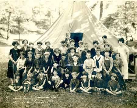 Fresh Air Camp (1925) shows boys and girls in the fresh air camp with the teachers behind them.