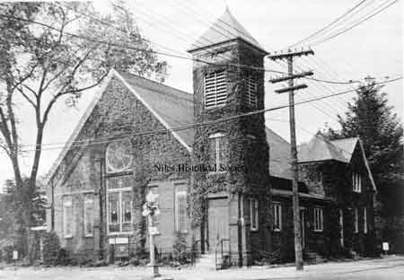 First United Presbyterian Church. In the mid 1920's the steeple was removed, leaving just the bell tower. It had become unsound and the slate that covered it was falling off.