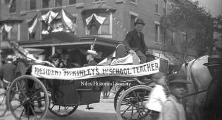 William McKinley's first teacher riding in carriage in front of the Allison Hotel at the corner of Main Street and Park Avenue.