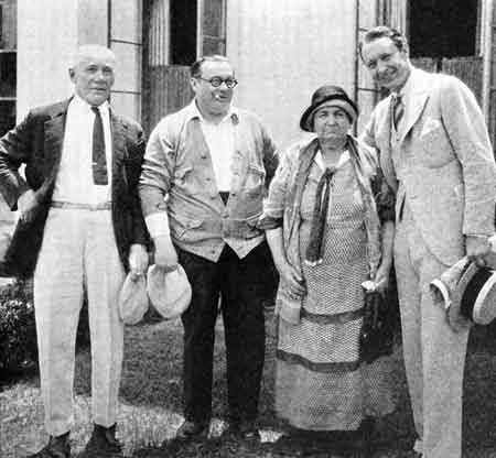 Here are the parents of the Warner brothers with Monte Blue, right, and Willard Louis