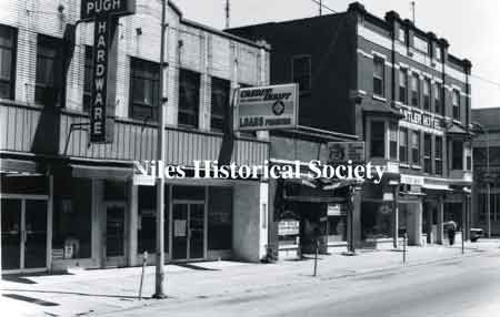 The Antler Hotel and adjoining buildings on North Main Street before urban renewal in 1976.