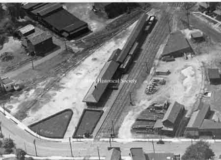 Aerial view on the right shows the B&O freight yard and terminal, grain & feed store at the curve on Church Street which connected to Robbins Avenue.