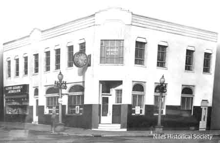 Hartzell Building on the corner with Leon Doubet jewelry store on South Main Street.