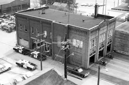Photo taken of the old Police and Fire Station located on the east side of the Post Office, on West Park Avenue in downtown Niles before urban renewal.